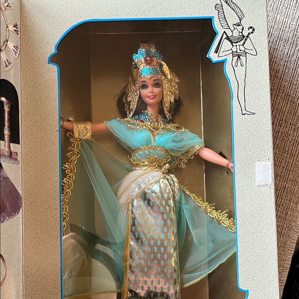 Elegant Egyptian-Inspired Doll with Gold Accents